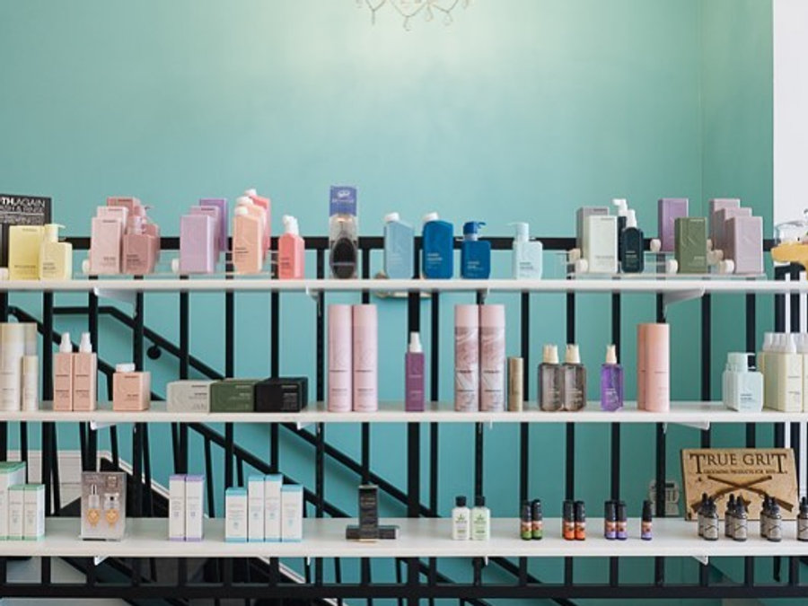 Wonderlust Salon product shelves with Kevin Murphy hair care